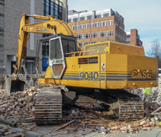 Building Demolition Contractors demolish church in UpTown Charlotte with Excavator. Image by W.C. Black and Sons, Inc.