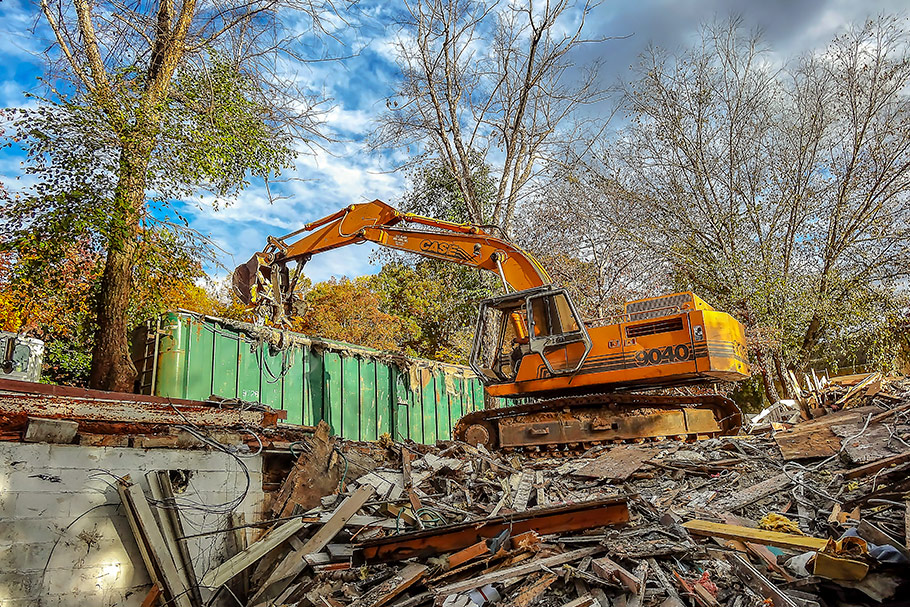 CASE Excavator Loading Demolition Debris at Apartment Demolition Project in Charlotte, NC. Image by W.C. Black and Sons, Inc.