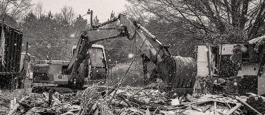 House Demolition during snow storm in 2014. Image by W.C. Black and Sons, Inc.